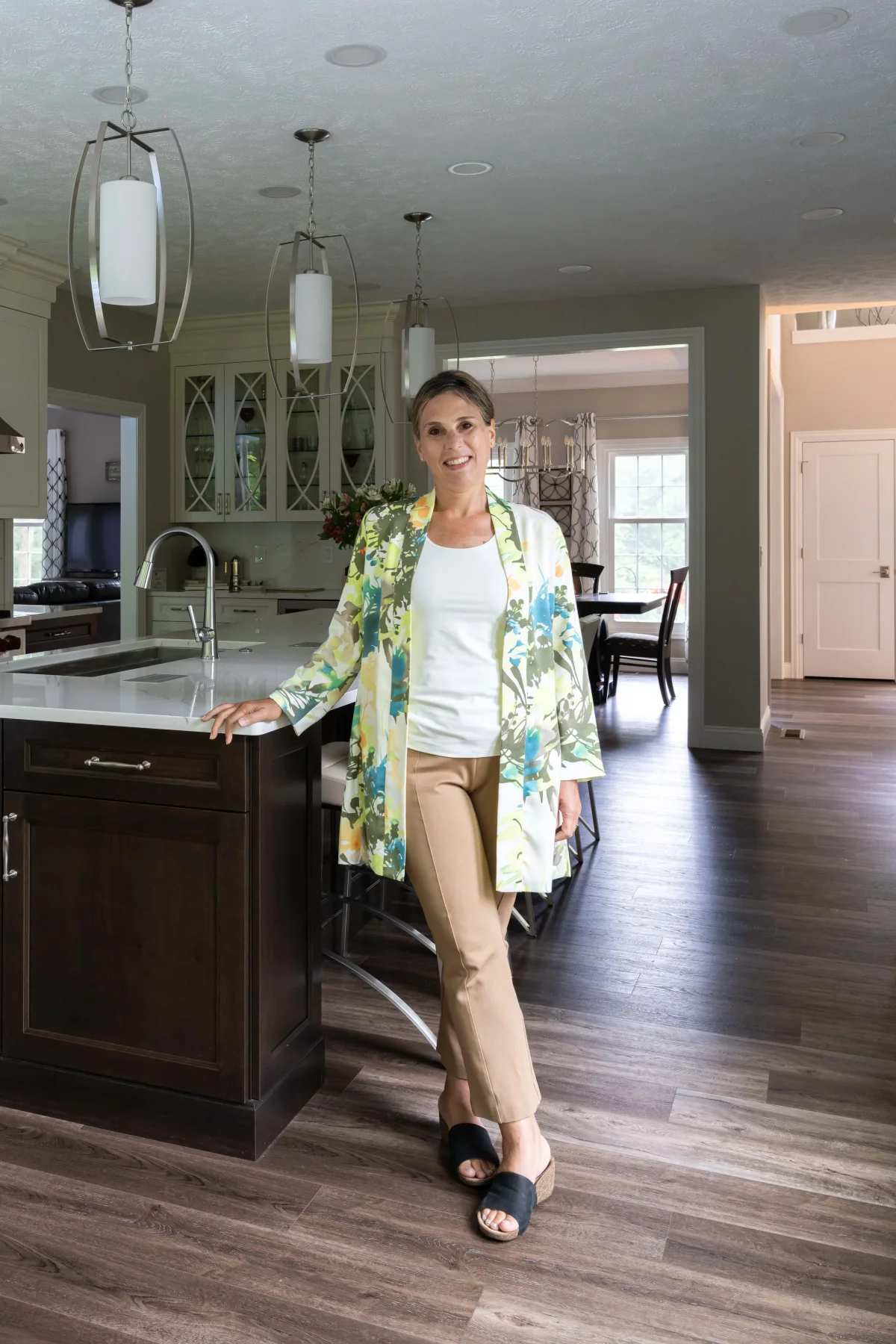 Design-build team workspace with remodeling tools, cabinetry samples, and project materials on display.